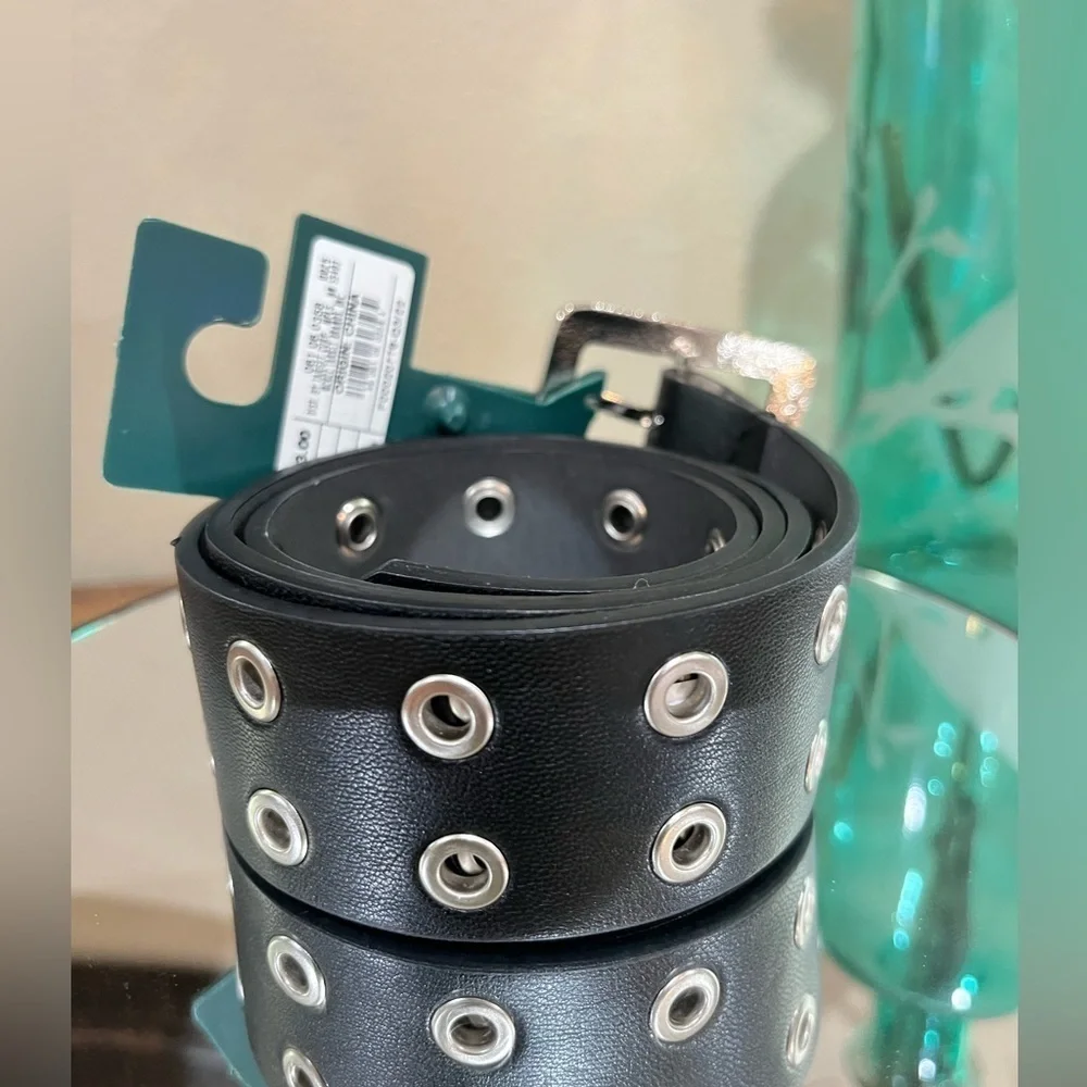 Women’s belt by Wild Fable, black in color with silver  grommets, size XS, new!